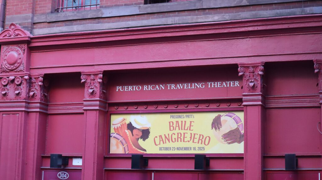 Baile Cangrejero large-format window graphic installed on the Pregones/PRTT facade